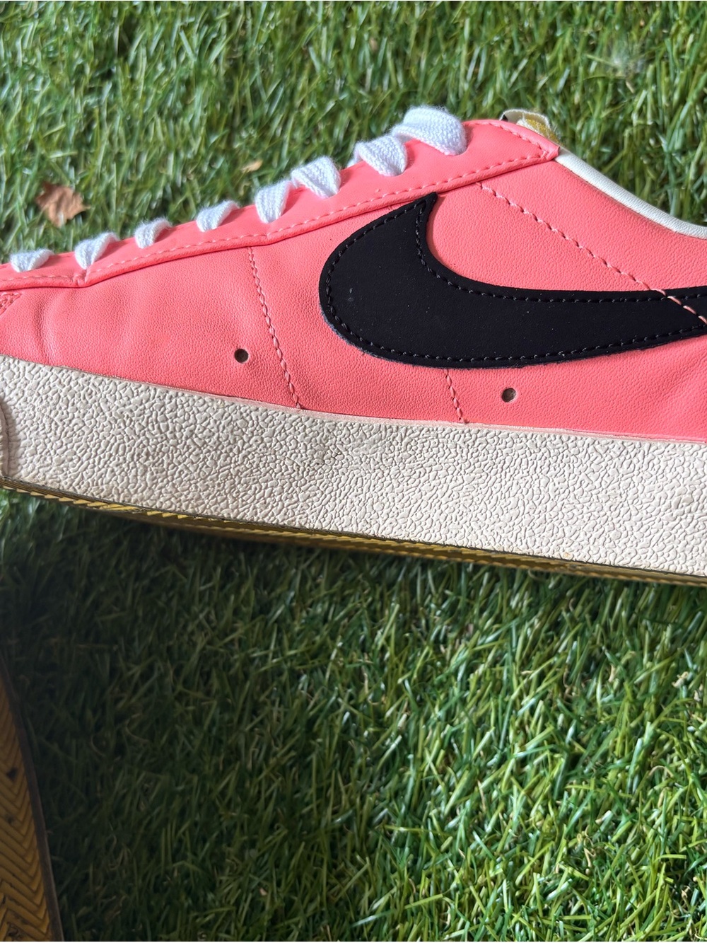 Nike Blazer Low ‘77 Sneaker in Coral Pink with Black Swoosh